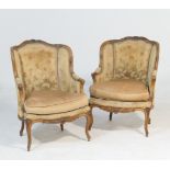 Pair of French walnut and upholstered tub chairs, circa 1900, with foliate fawn coloured upholstered