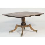 Late Regency mahogany tilt top breakfast table, circa 1825, the rectangular top with broad