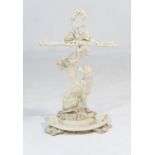 Victorian painted cast iron stick stand, formed as a hound seated beneath an oak tree, with demi-