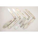 Five Victorian and Edwardian silver and mother of pearl folding fruit knives, including an example