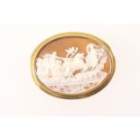 Cameo brooch, 20th Century, carved with Phoebus and the Hours proceeded by Aurora, 37mm x 28mm,