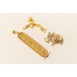 9ct gold elephant charm, 20mm, weight approx. 6.1g; also an unmarked gold charm modelled as a