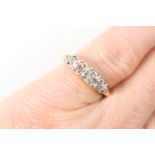 Diamond five stone ring, set with old round brilliant cut diamonds, graduating in size and totalling