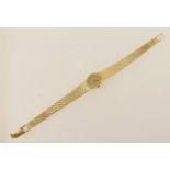 Longines lady's 9ct gold bracelet wristwatch, signed oval gilt 16mm dial with baton numerals, manual
