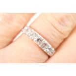 Diamond half eternity ring by Boodle & Dunthorne, set with seven round brilliant cut diamonds,