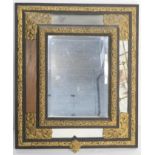 Venetian pressed brass wall mirror, traditional design worked with borders of flowers and