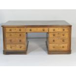 Victorian mahogany partner's desk, circa 1900, the top moulded rounded corners and green leather