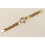 Zenith lady's 18ct gold and diamond bracelet wristwatch, signed 16mm silvered dial with baton