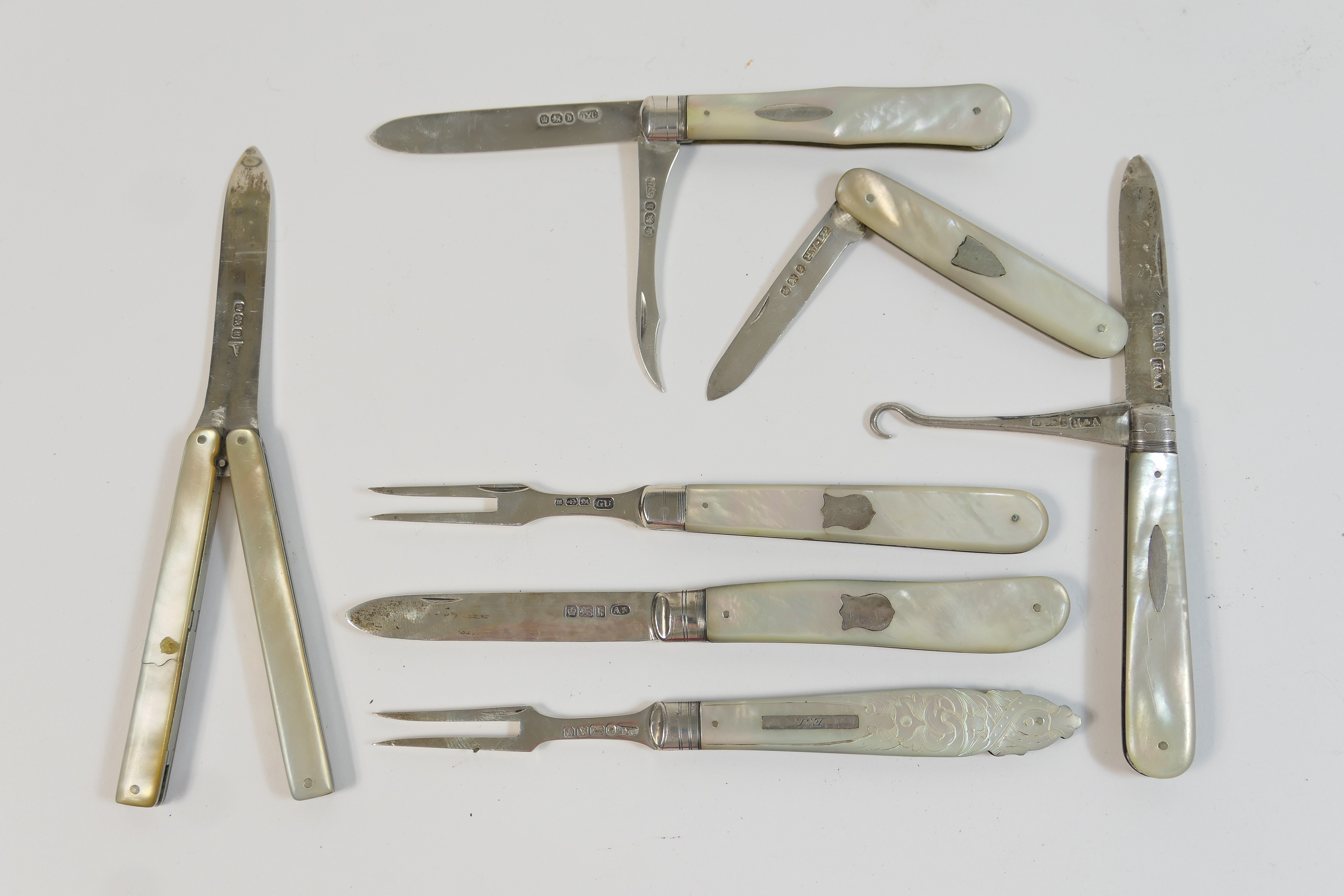 Victorian silver and mother of pearl folding fruit fork, maker JYC, Sheffield 1865; also a further