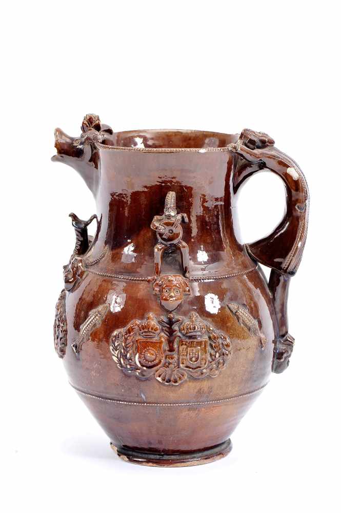 A Jug, glazed clay, decoration en relief and brown monogram "Coat of arms of the Empire of Brazil