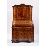 A Bureau with Bookcase, walnut and burr-walnut veneer, mahogany friezes, interior with drawers and