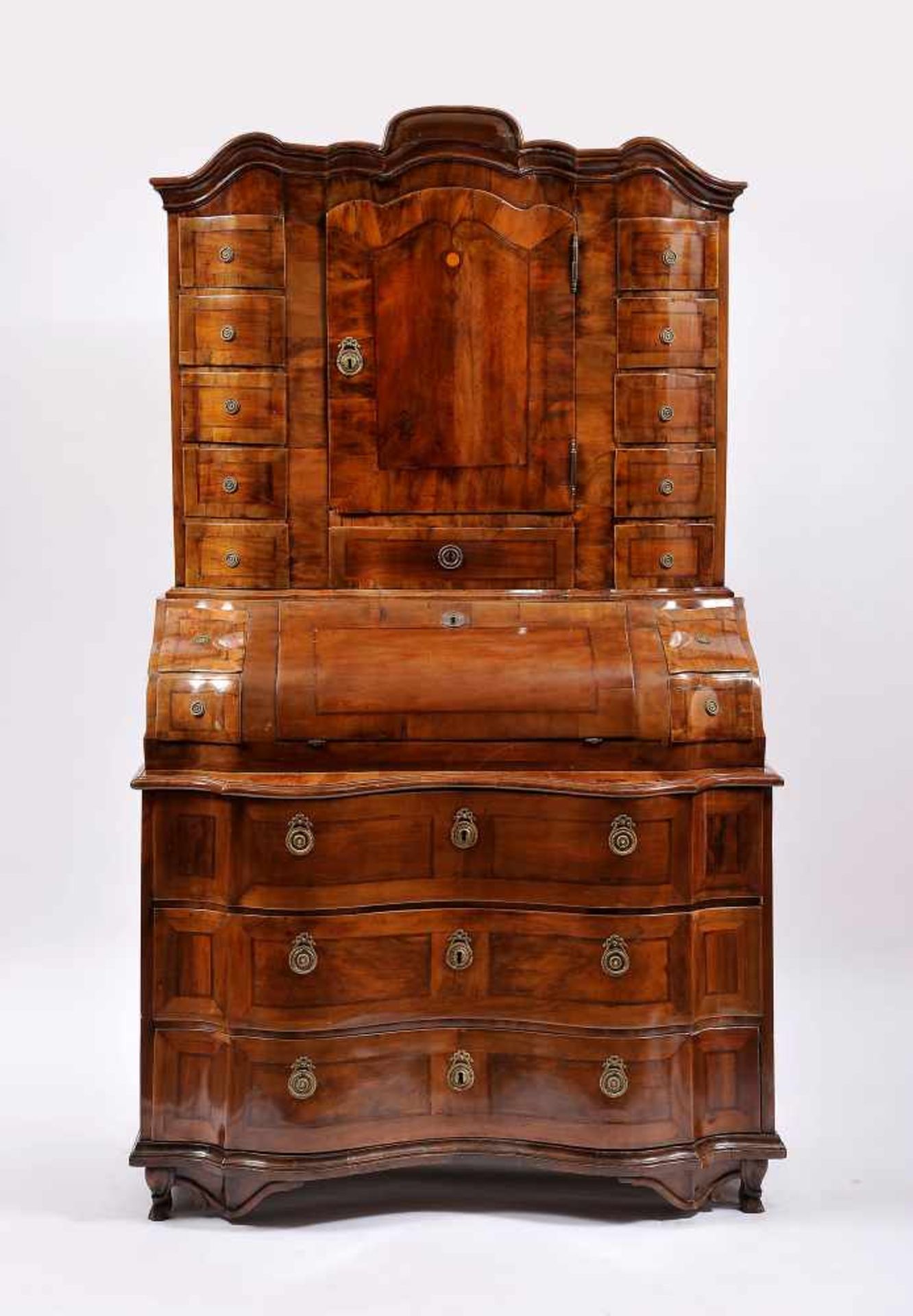 A Bureau with Bookcase, walnut and burr-walnut veneer, mahogany friezes, interior with drawers and