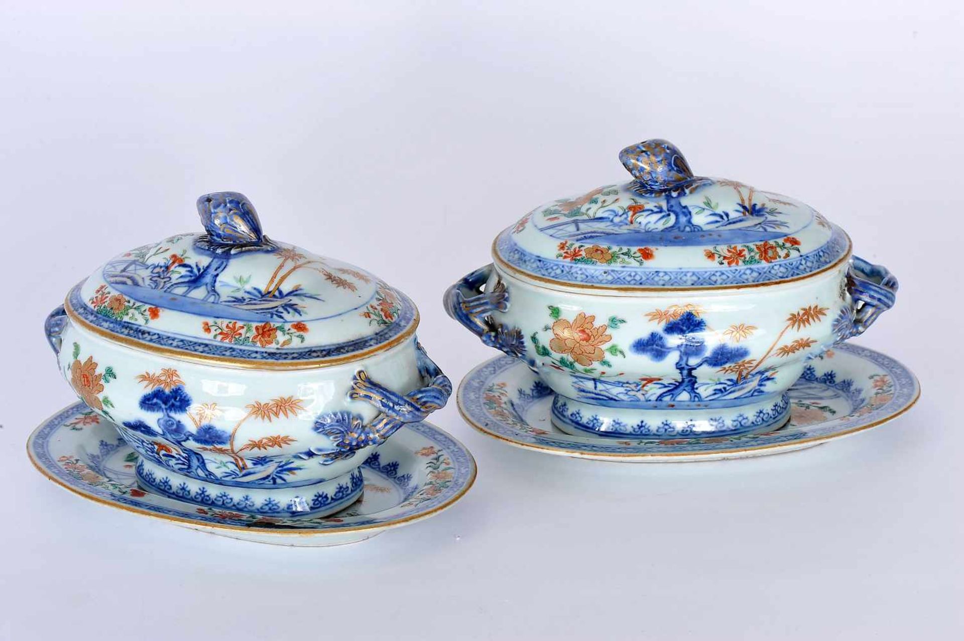 A Pair of Small Tureens with Oval Stands, Chinese export porcelain, polychrome and gilt