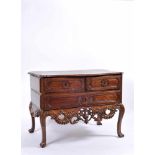 A Commode, D. João V, King of Portugal (1706-1750), carved walnut, scalloped, pierced and carved