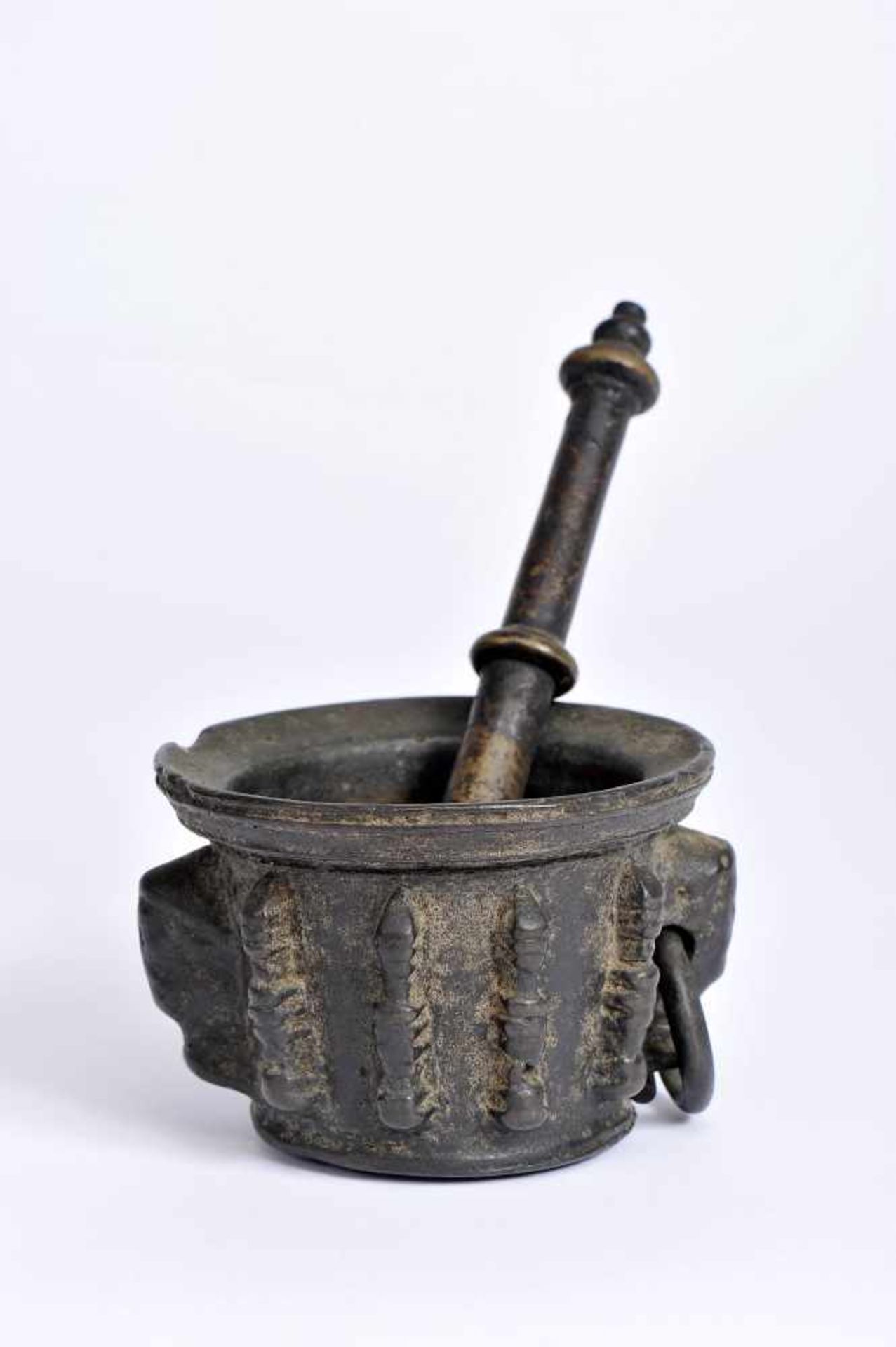 A Mortar with Pestle, Renaissance, bronze, ribbed decoration en relief and spikes "grotesque