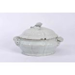 A Tureen, porcelain, white monochrome decoration, handles en relief "Animal coming out of the