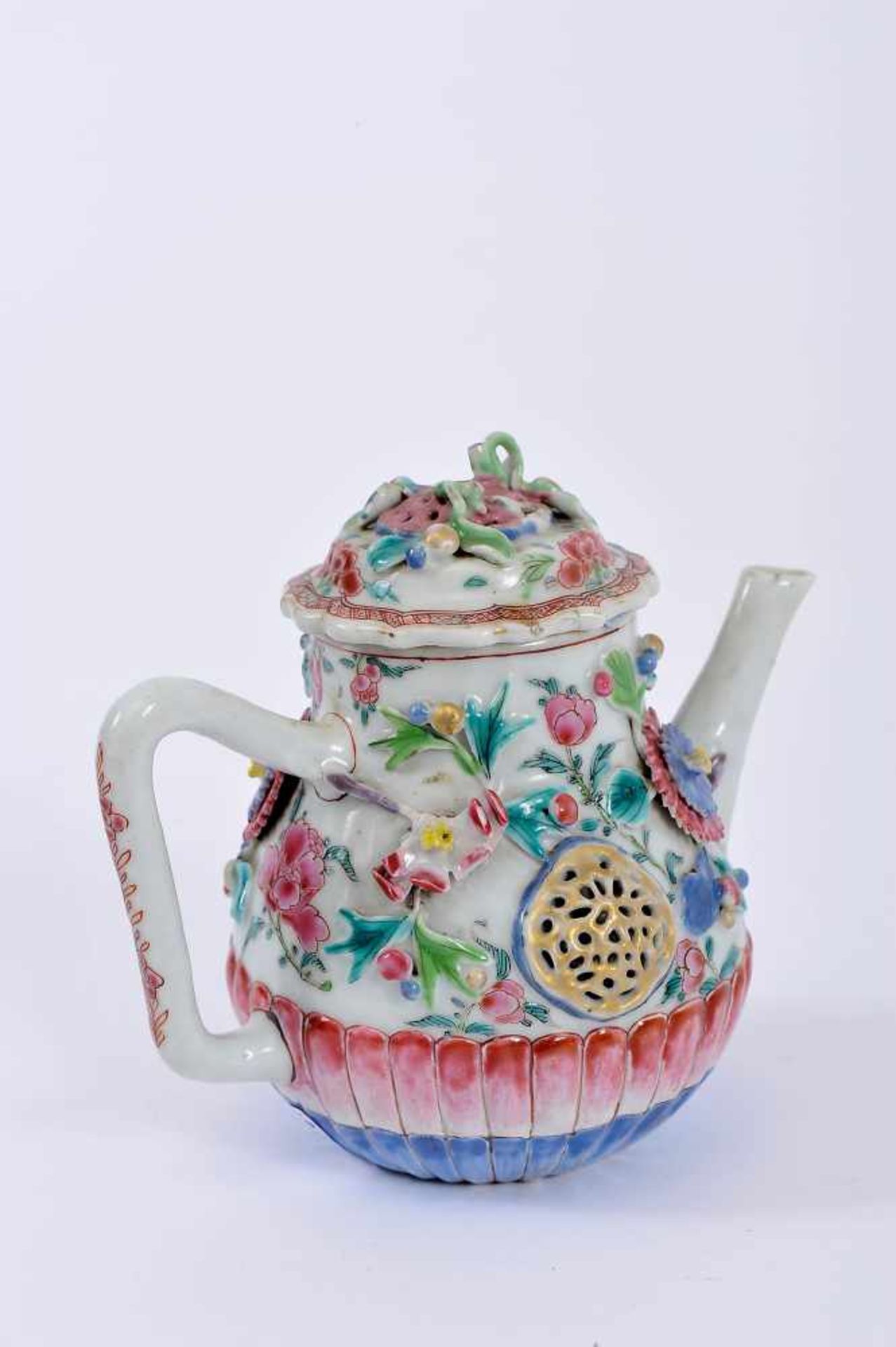 A Teapot, Chinese export porcelain, polychrome and gilt "soft paste" decoration en relief "Flowers",