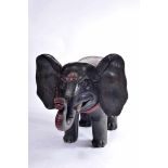 A Caparisoned Elephant, polychrome wood sculpture, Indian, 20th C., minor faults and defects,