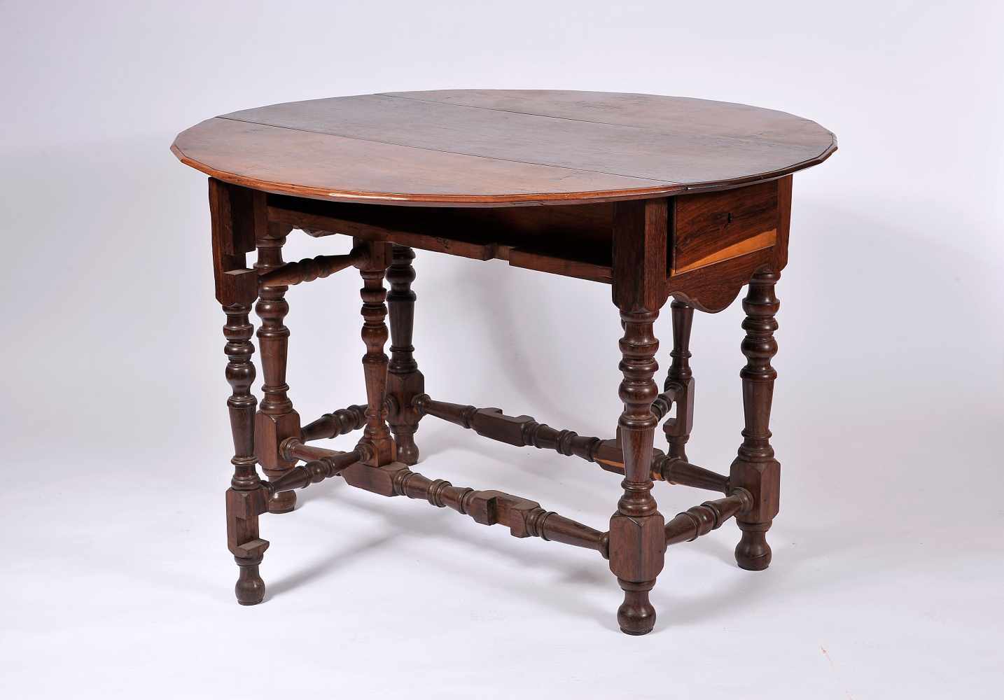 A Gate Leg Table with Two Drawers, Brazilian rosewood, multi-faceted edge top, turned legs and - Image 2 of 2