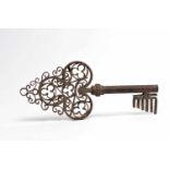 A Big Key, wrought iron, European, 17th C., wear on the iron, Dim. - 44 cm