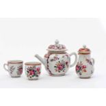 A Teapot, a milk jug and two cups, Chinese export porcelain, polychrome decoration "Flowers",
