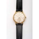 An INTERNATIONAL WATCH Wrist Watch, 750/1000 gold case, leather bracelet, winding mechanical