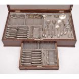 Flatware for twelve people, 833/1000 silver, handles with decoration en relief, consisting of 16