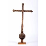 A Processional Cross, carved and polychrome wood with traces of gilding, Iberian, 17th C., faults on
