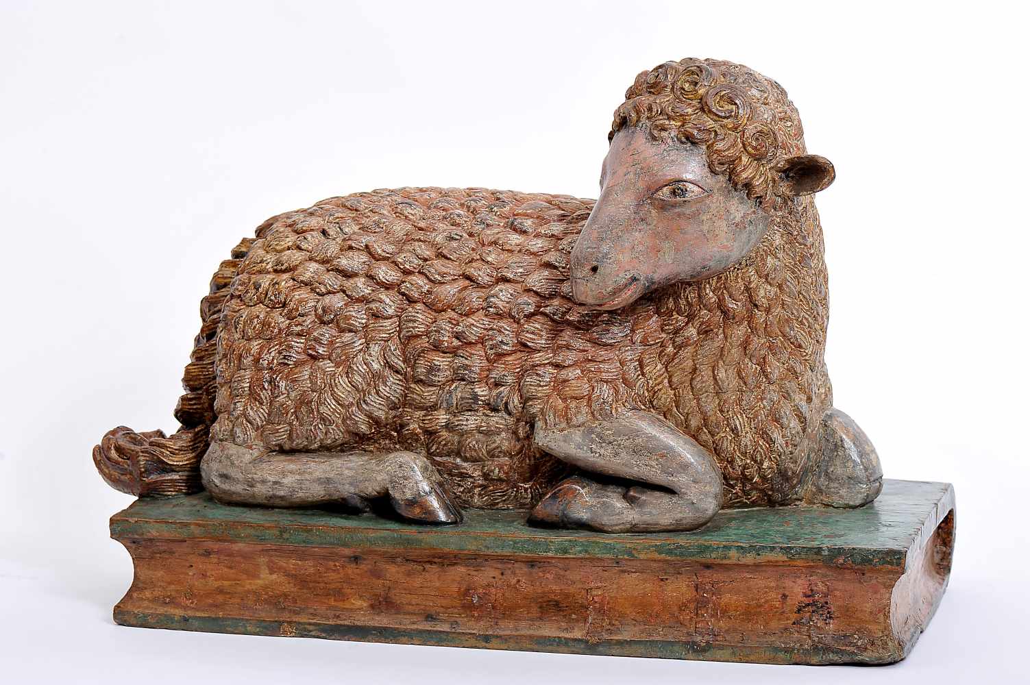 Agnus Dei, painted teak sculpture with traces of gilding, Indo-Portuguese, 17th C., small