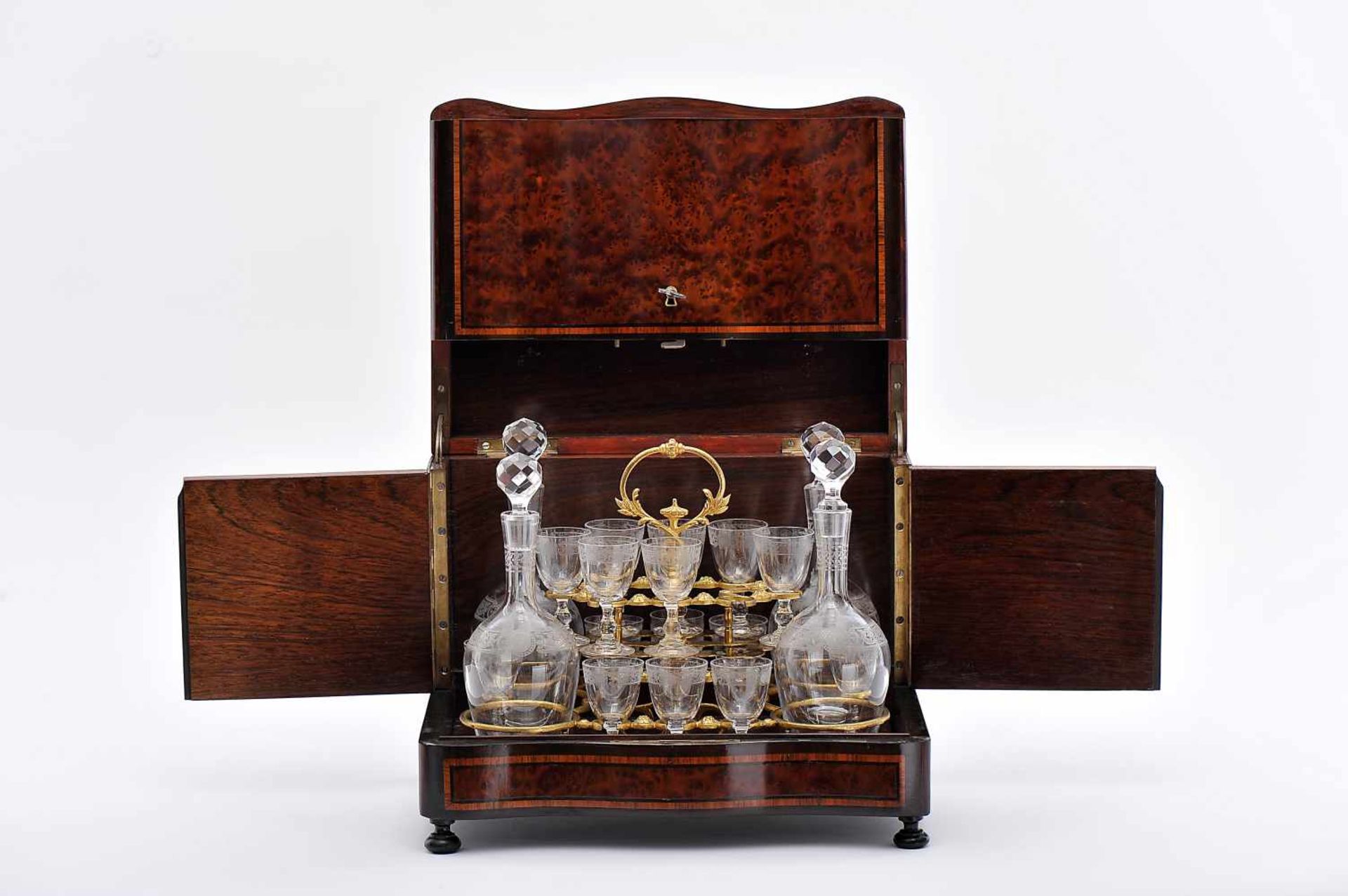 A Liquor Box, Napoleon III, burr-mahogany veneered wood, gilt metal frame with four bottles and