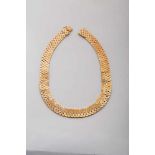 A Necklace, 750/1000 bicolour gold, pounded mesh with geometric pattern set with 11 8/8 cut diamonds