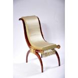 A Chair, Empire style, mahogany with gilt carvings, upholstered seat and back with trimming and