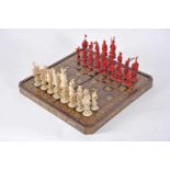 Chess Pieces, and Board, carved ivory with all the pieces "Chinese Figures representing King