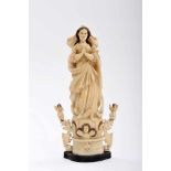 Our Lady of the Immaculate Conception flanked by Angels, partly polychrome ivory sculpture, carved