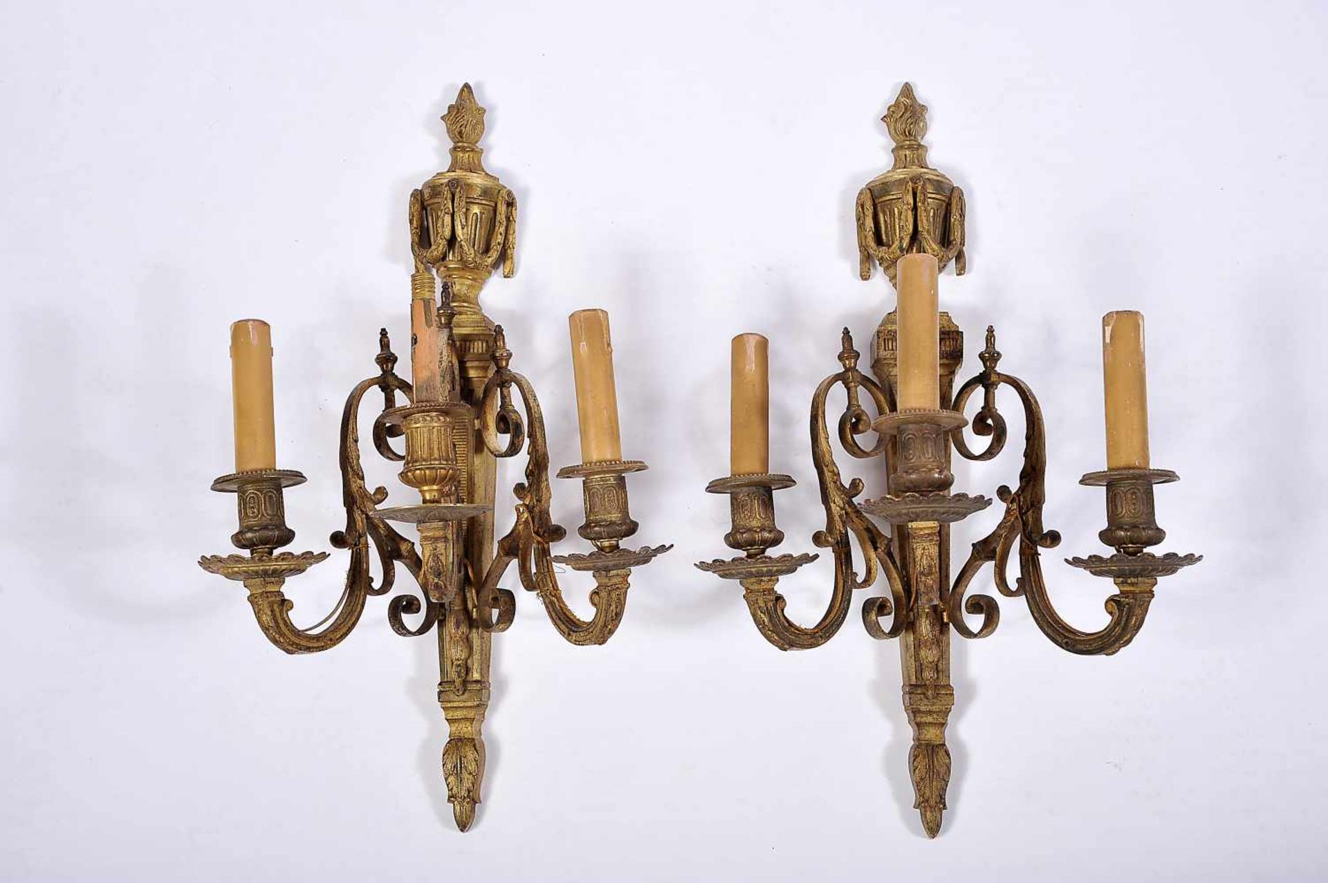 A Pair of Three-light Wall Sconces, Louis XVI style, chiselled and gilt bronze en relief, French,