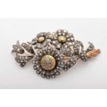 A Brooch - "Leaves and Flowers", gold and silver, set with rose and table cuts diamonds and 49