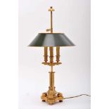 A Three-light Table Lamp, chiselled and gold powder gilt bronze, green-painted tinplate lampshade,