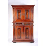 A Glassware Cupboard, mannerist, Brazilian rosewood and red marblewood, padded doors, drawers