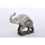 An Elephant, pietra dura sculpture, 925/1000 silver head, simulating ivory tusks, Portuguese, 20th