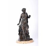 A Female figure with Flower Bouquet, bronze sculpture, marble base, 19th/20th C., signed CH. JANSON,