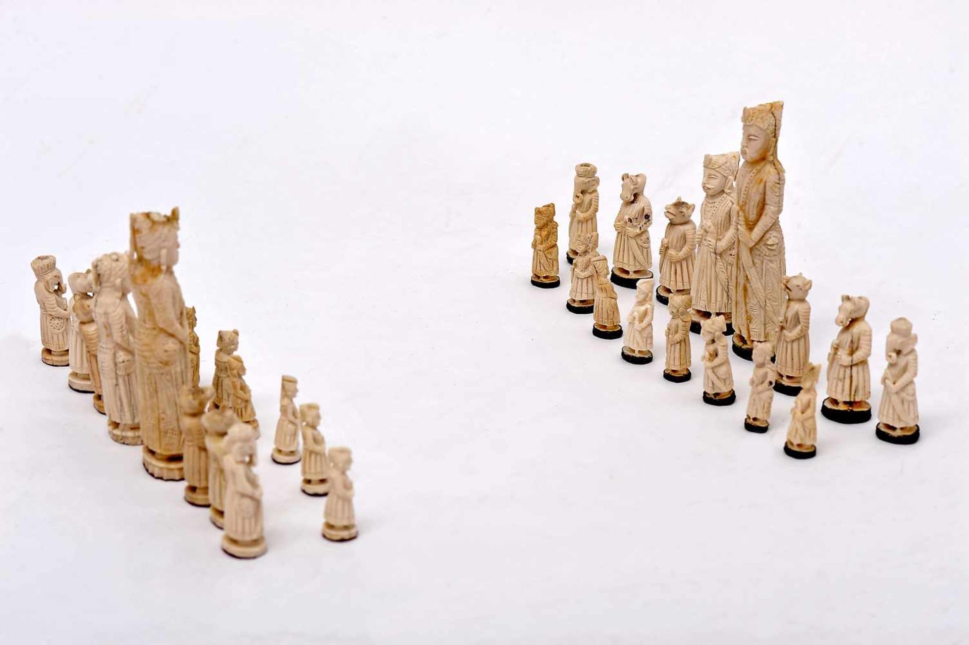 Chess Pieces, sculpted bone, one of the sets with dyed black bases, King and Queen representing