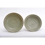 A Pair of Bowls, Chinese glazed stoneware, green "Celadon" monochrome decoration. Ming period (