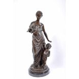 A Female figure with child and doves, bronze sculpture, marble base, French, 19th/20th C., signed A.