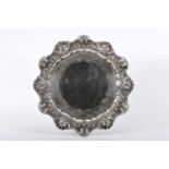 A Large Scalloped Salver with Four Feet, 833/1000 silver, rim with decoration en relief and engraved