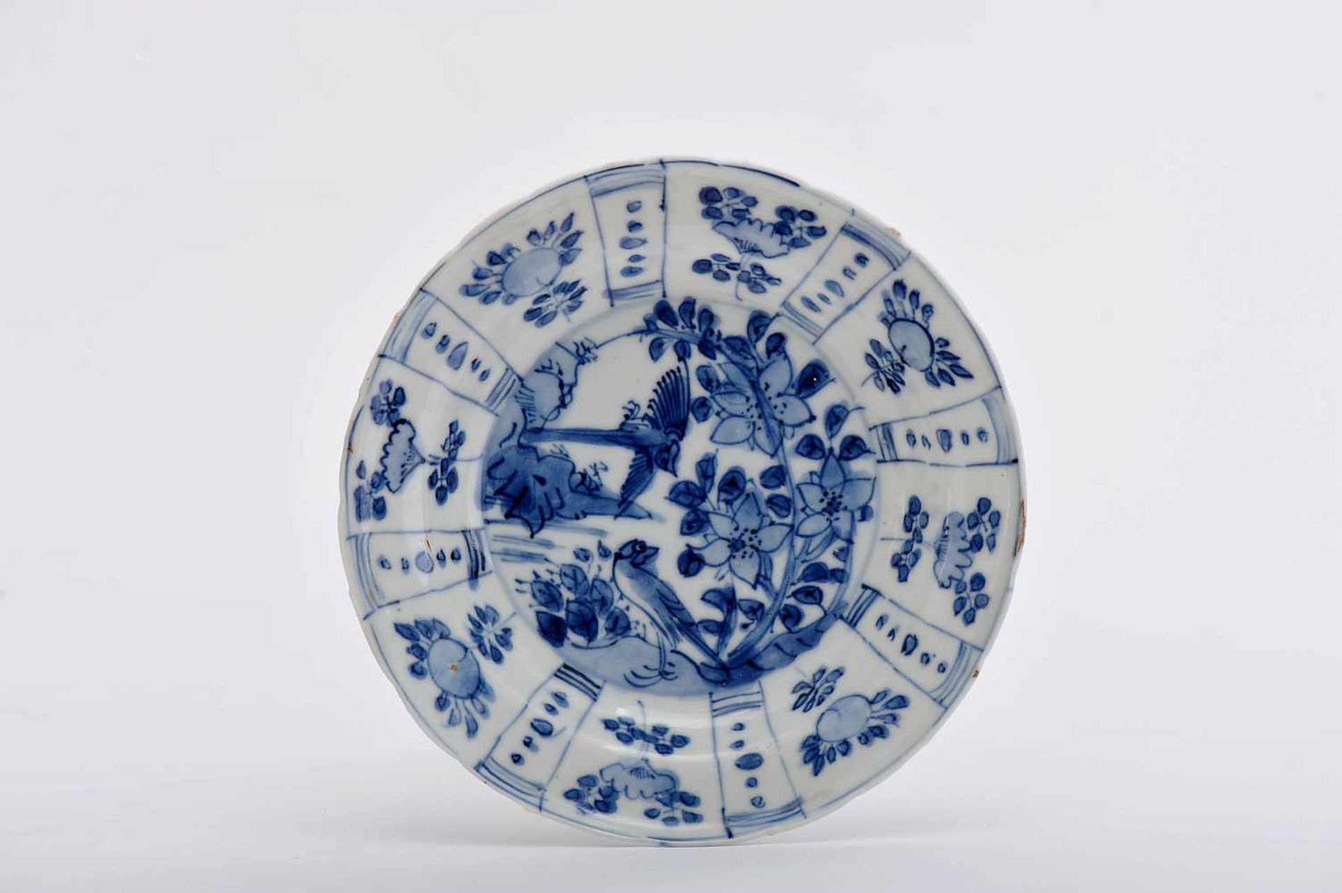 A Small Scalloped Dish, Chinese export porcelain (Kraak), blue decoration "Landscape with birds",