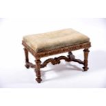 A Footstool, Louis XIV style, carved, painted and gilt wood, upholstered seat, French, 19th C.,