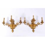 A Pair of Three-light Wall Sconces, Louis XVI style, gilt bronze en relief, French, 20th C.,