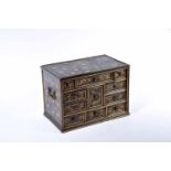 A Small Bureau, Namban Art, black lacquer fully coated wood, gilt decoration with mother-of-pearl
