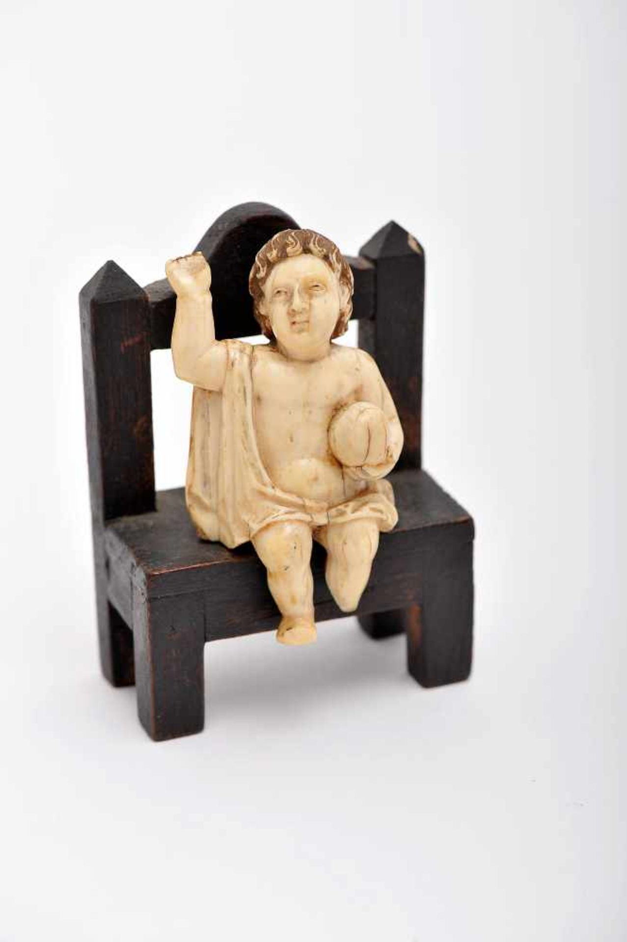 The Child Jesus, Saviour of the World seated, ivory sculpture with paintings, Indo-Portuguese,