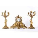 A Garniture - Table Clock and a Pair of Six-light Candelabra, Louis XV style, gilt bronze mounts "